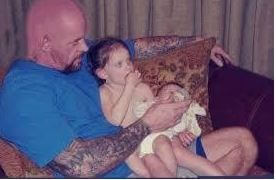 Mark Calaway with two of his daughters in an old photograph